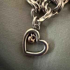 Silver Heart Charm with gold heart in middle